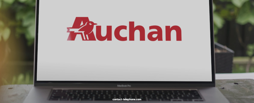 Logo Auchan indiqué sur l'écran d'un ordinateur.